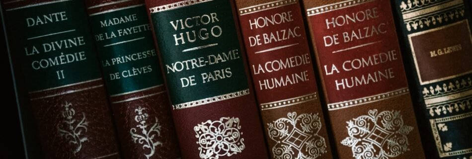 red and brown hardbound books